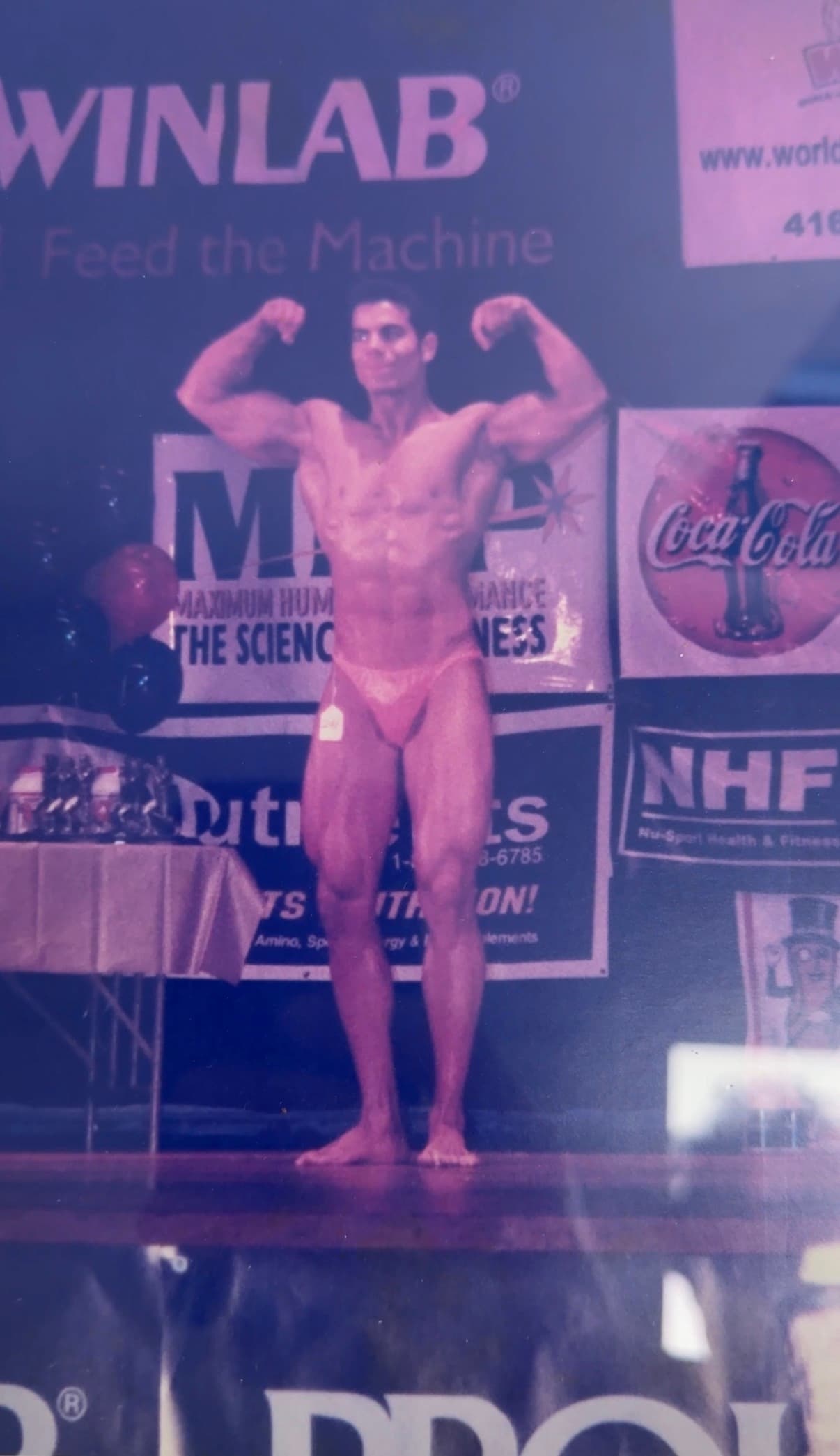 Alex Savva winning his first natural bodybuilding competition at age 20