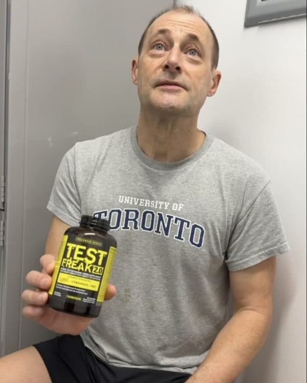 Glen before, seated, holding a bottle of Test Freak