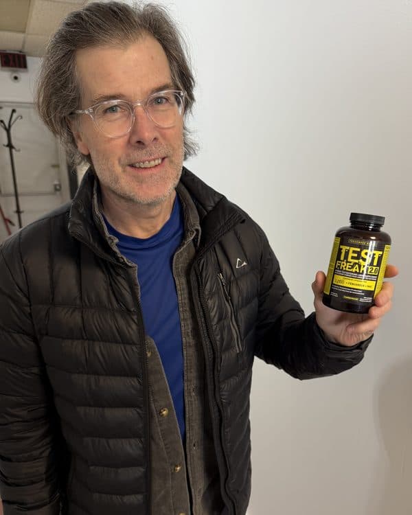 Scott before, holding a bottle of Test Freak